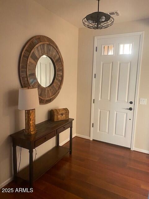 2029 North 164th Avenue Goodyear, AZ 85395 - Photo 2 of 17 a view of a livingroom with furniture and wooden floor