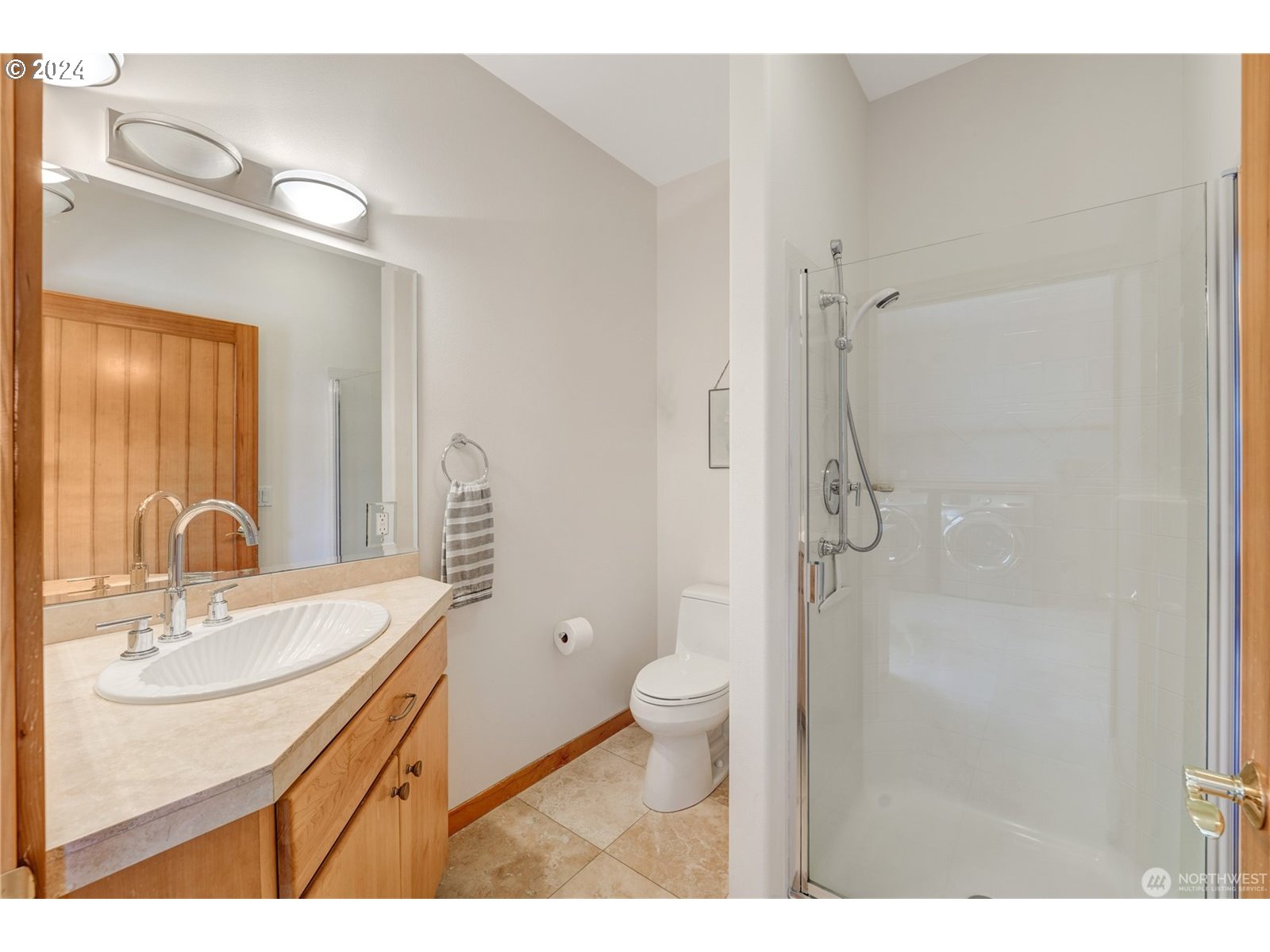 4844 G Loop Bow, WA 98232 - Photo 11 of 40 a bathroom with a sink toilet a mirror and shower