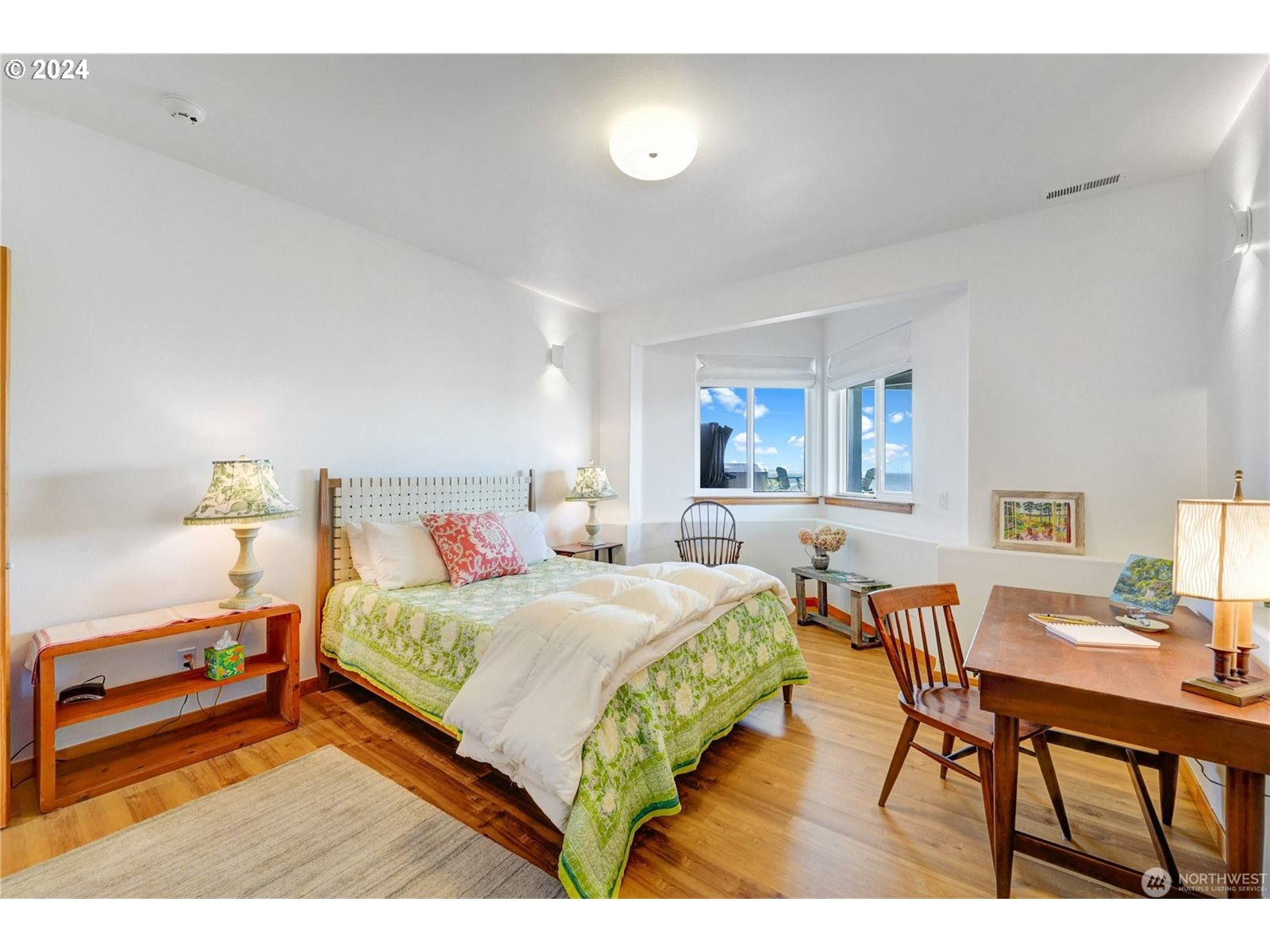 4844 G Loop Bow, WA 98232 - Photo 24 of 40 a bedroom with a bed and a table in it