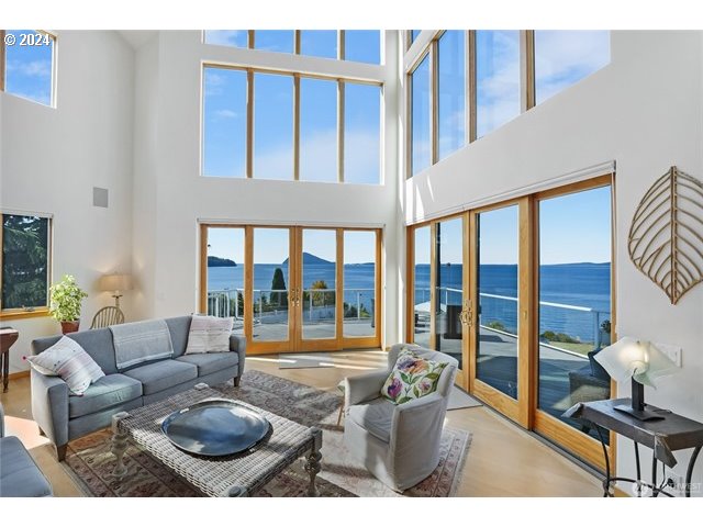 4844 G Loop Bow, WA 98232 - Photo 4 of 40 a living room with furniture a floor to ceiling window and floor to ceiling window