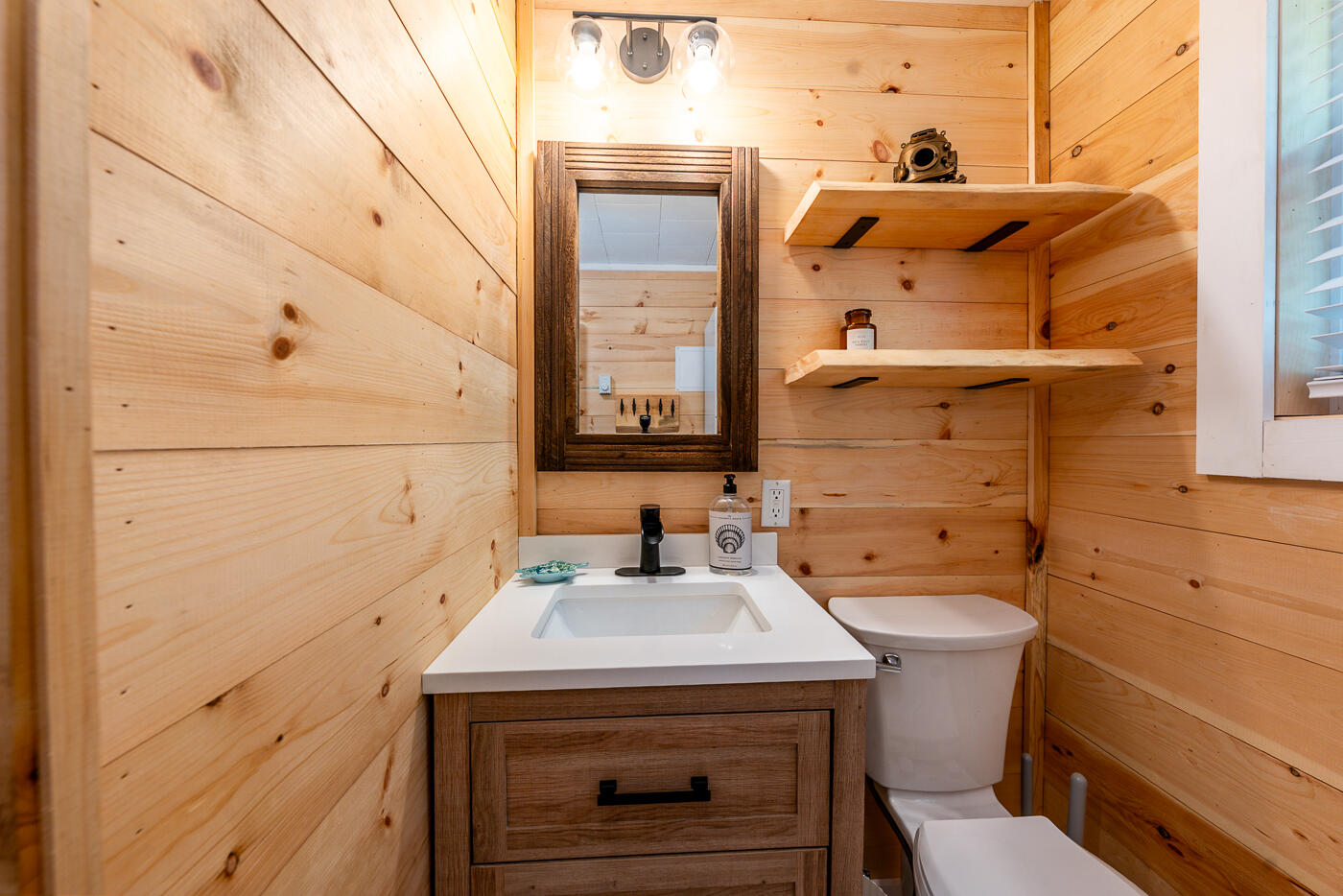 60 Long Avenue, Unit E Wellfleet, MA 02667 - Photo 12 of 18 a bathroom with a sink and a toilet