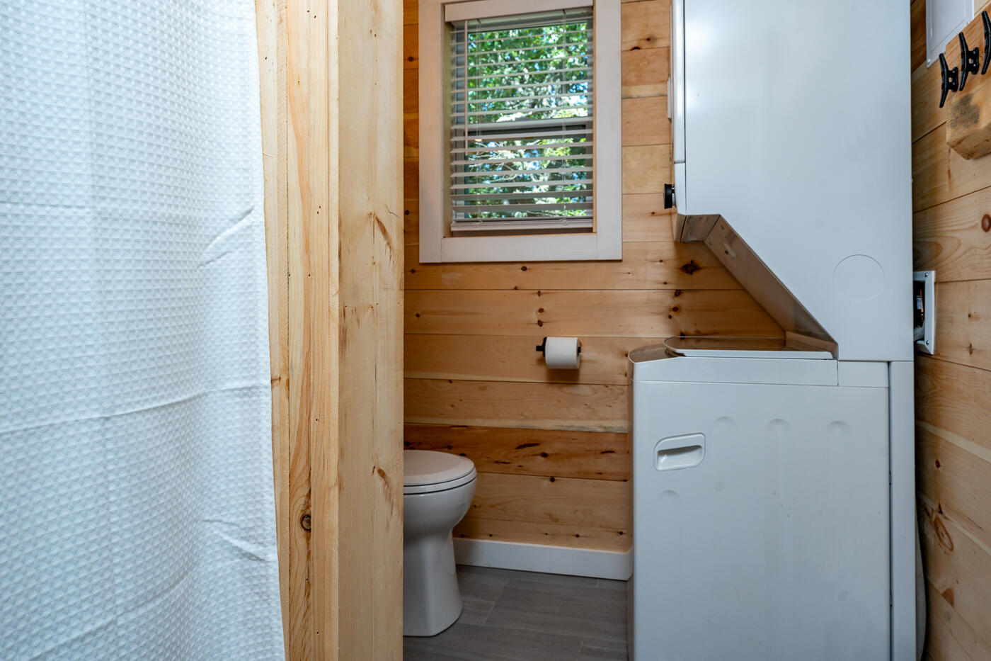 60 Long Avenue, Unit E Wellfleet, MA 02667 - Photo 13 of 18 a bathroom with a sink a toilet and shower