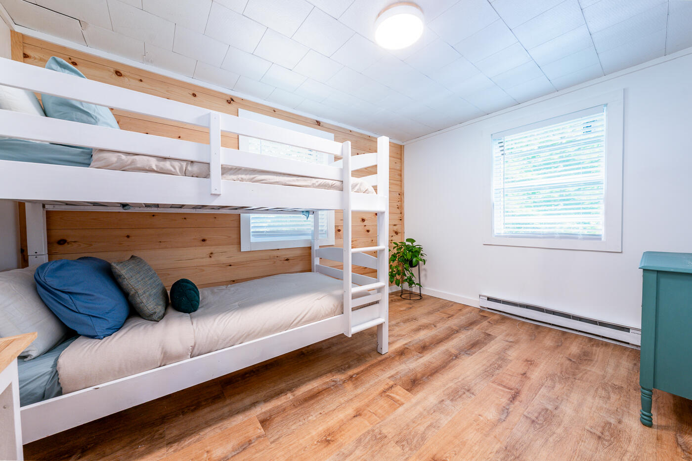 60 Long Avenue, Unit E Wellfleet, MA 02667 - Photo 14 of 18 a bedroom with a bed and a window