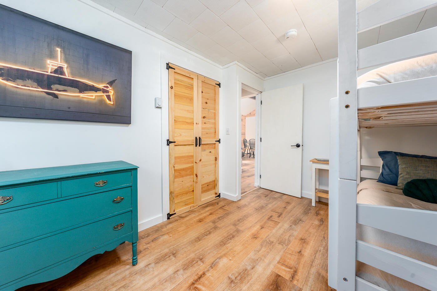 60 Long Avenue, Unit E Wellfleet, MA 02667 - Photo 15 of 18 a view of room with window and hardwood floor