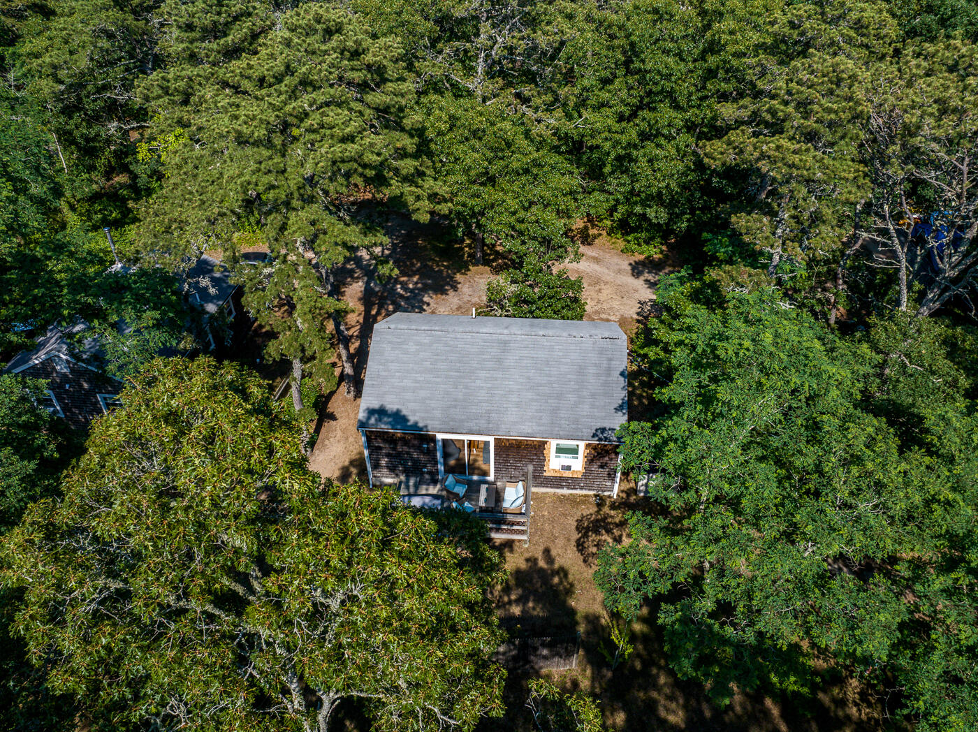 60 Long Avenue, Unit E Wellfleet, MA 02667 - Photo 17 of 18 an aerial view of a house with yard and outdoor seating