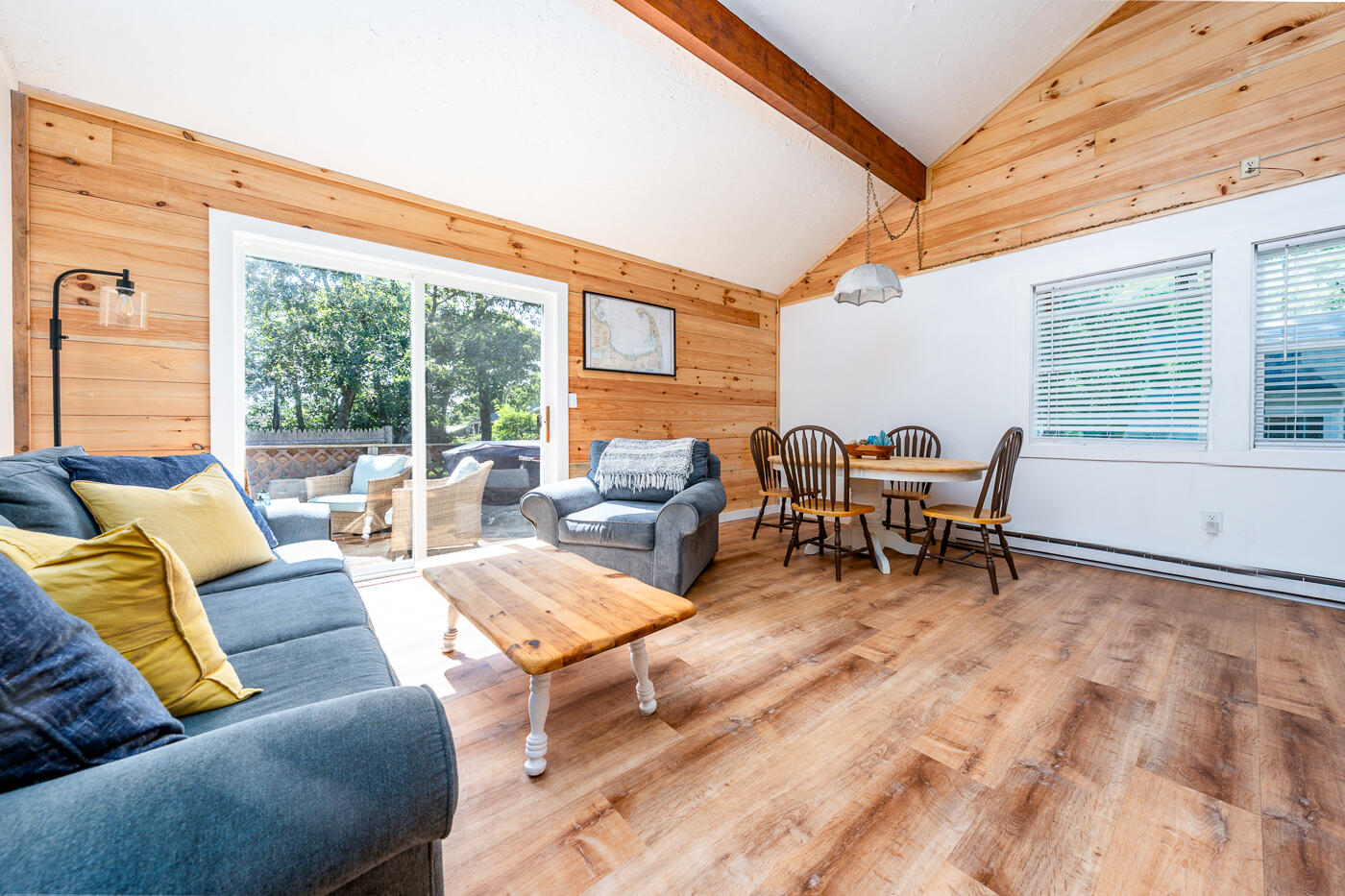 60 Long Avenue, Unit E Wellfleet, MA 02667 - Photo 8 of 18 a living room with furniture and a large window