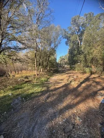 a view of a yard with mountain view