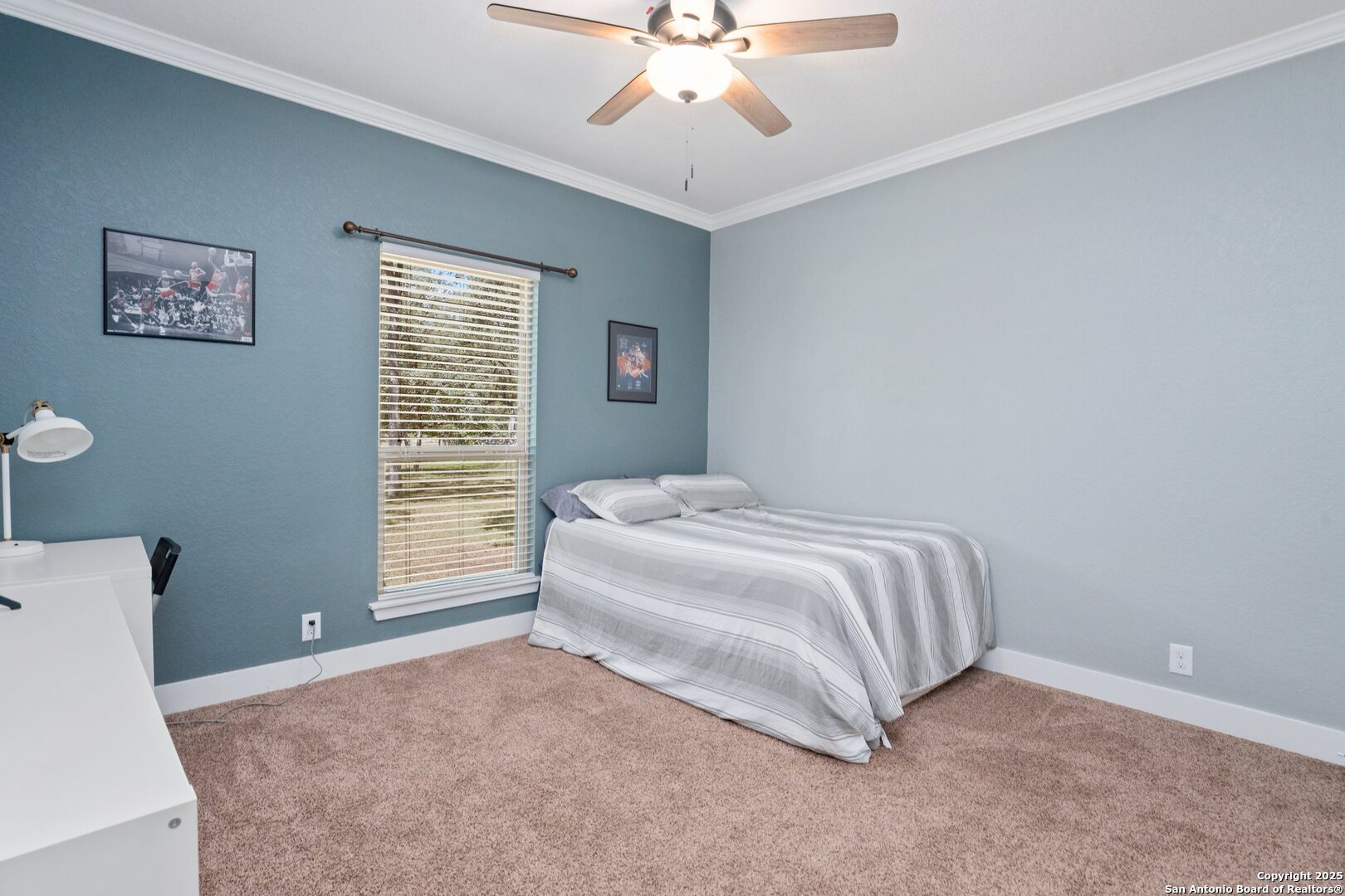 10015 Kopplin Road New Braunfels, TX 78132 - Photo 17 of 38 a spacious bedroom with a bed and a window