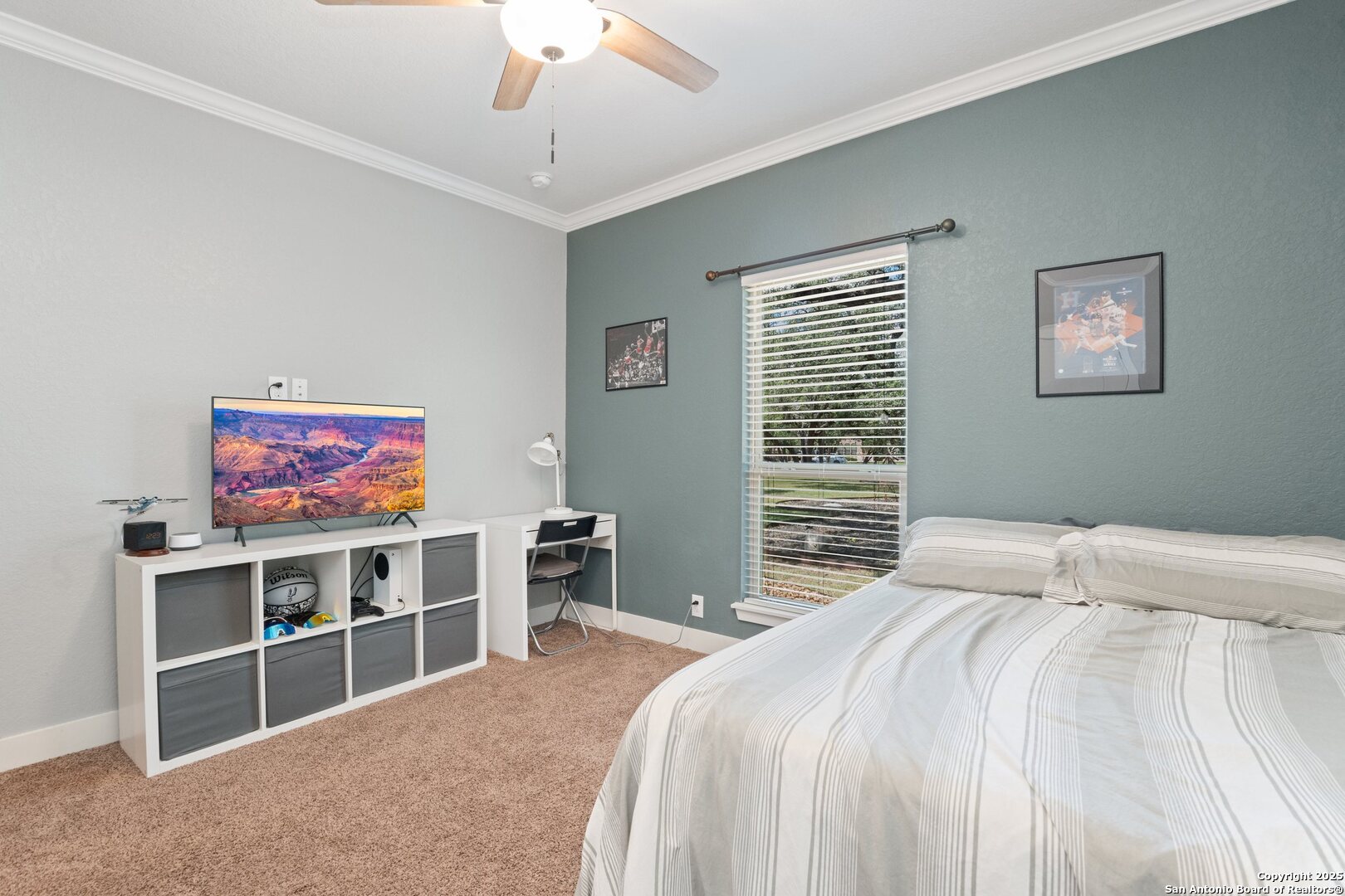 10015 Kopplin Road New Braunfels, TX 78132 - Photo 18 of 38 a bedroom with a large bed and a window