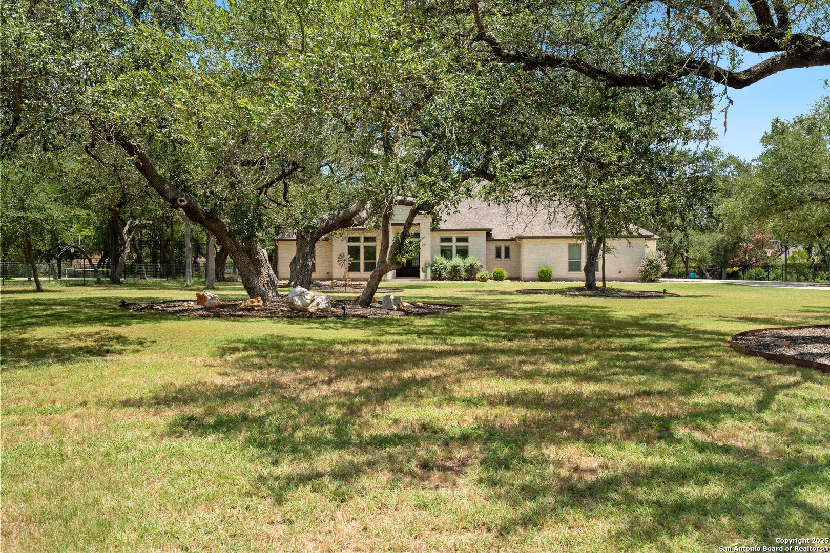 10015 Kopplin Road New Braunfels, TX 78132 - Photo 30 of 38 a front view of a building with trees