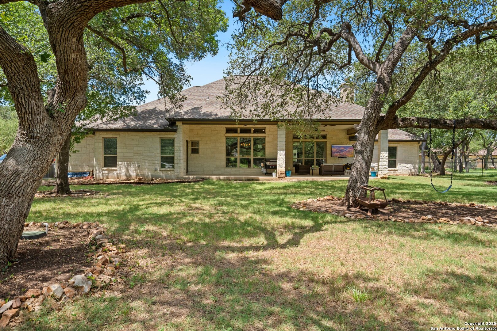 10015 Kopplin Road New Braunfels, TX 78132 - Photo 34 of 38 front view of a house with a yard