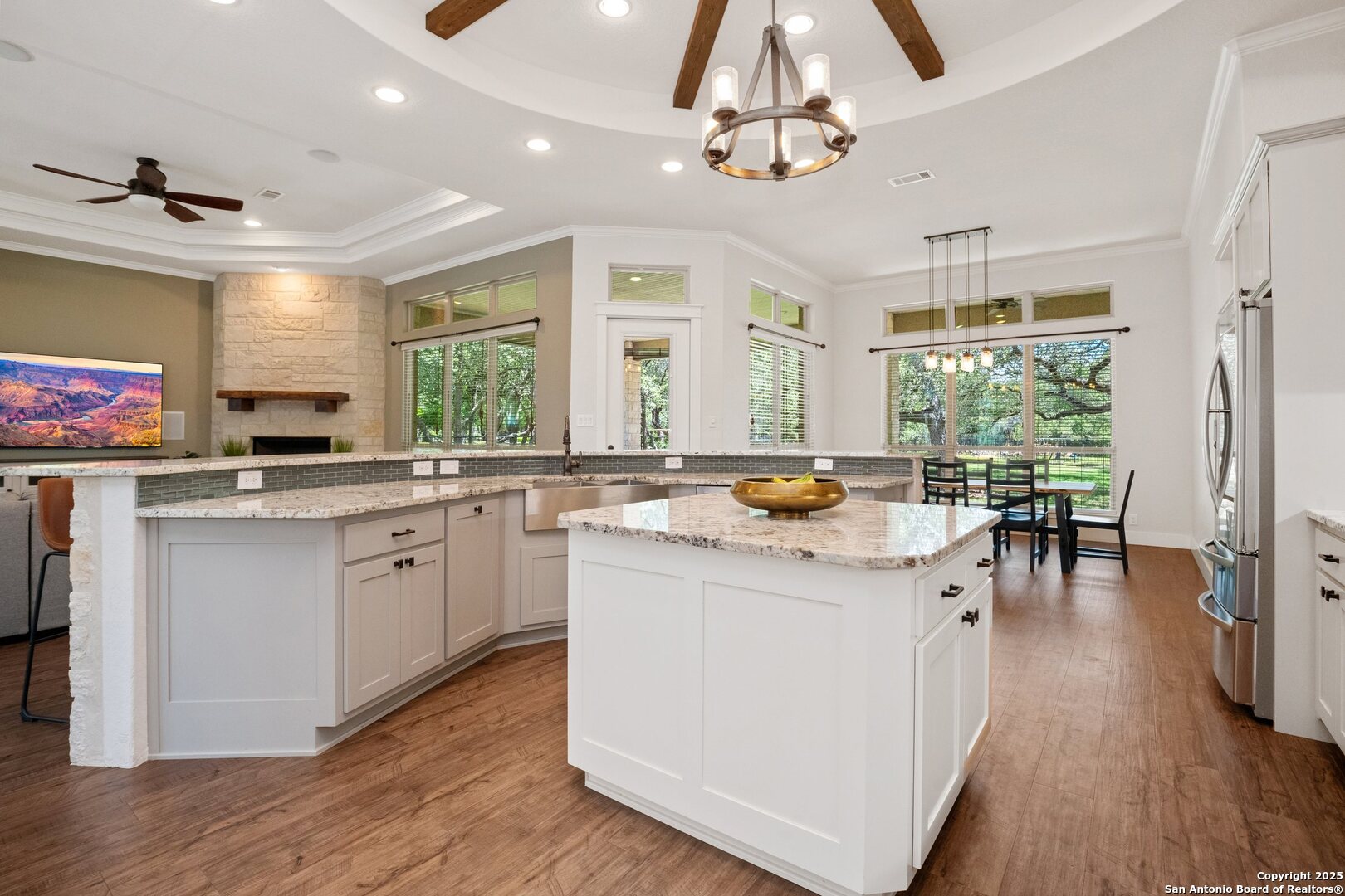 10015 Kopplin Road New Braunfels, TX 78132 - Photo 8 of 38 a kitchen with a sink stove and cabinets