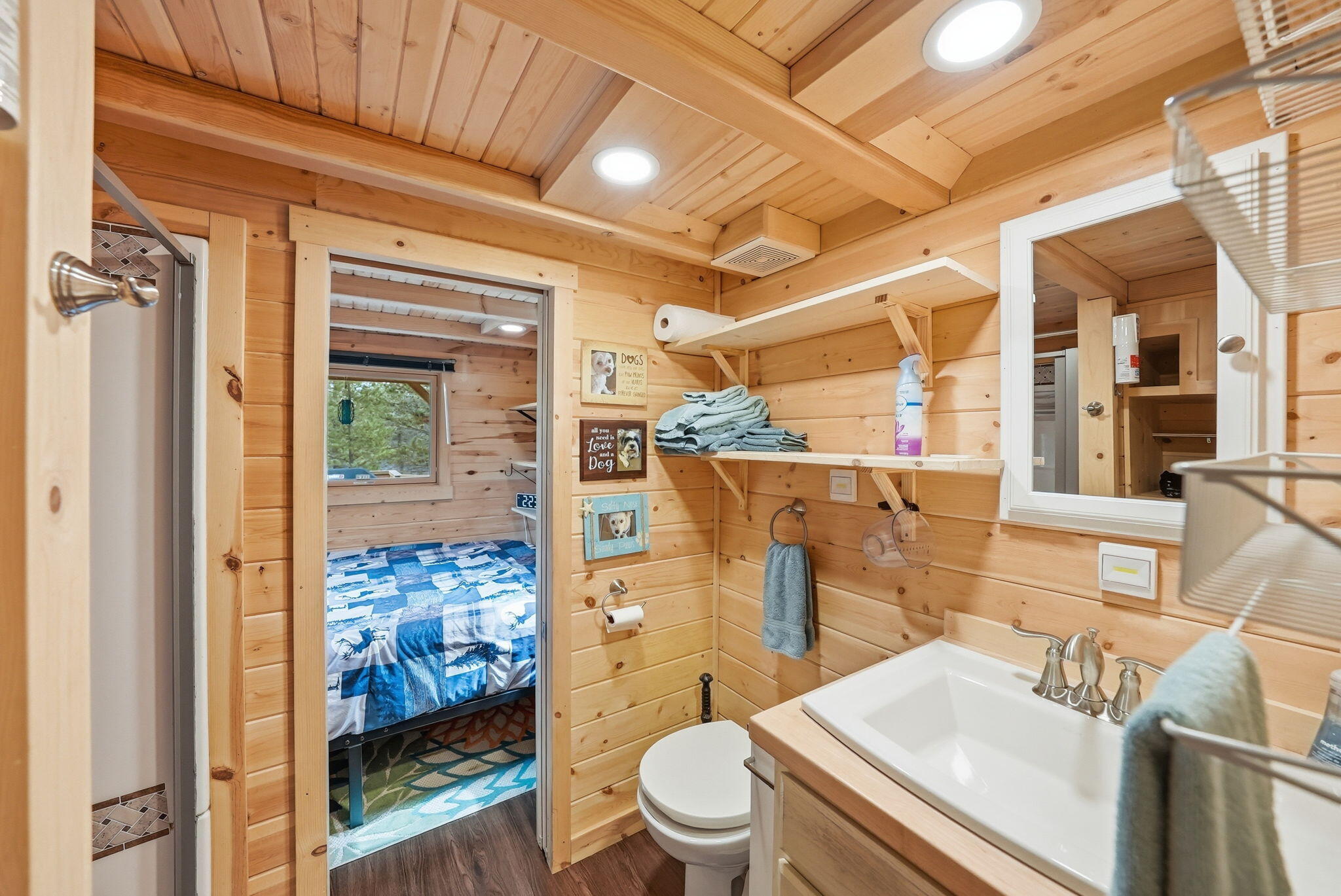 54270 Huntington Road La Pine, OR 97739 - Photo 51 of 68 a bathroom with a sink a toilet a mirror and shower