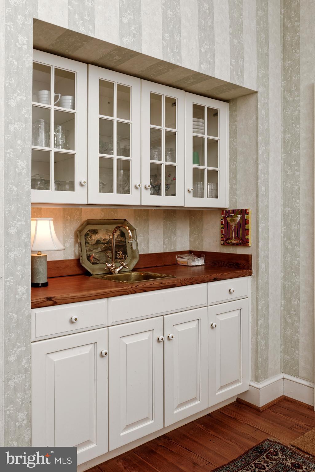 154 Clay Hill Road Boyce, VA 22620 - Photo 25 of 49 a kitchen with granite countertop white cabinets and sink