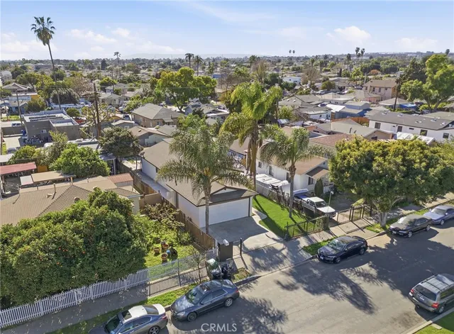 an aerial view of a city with lots of residential buildings