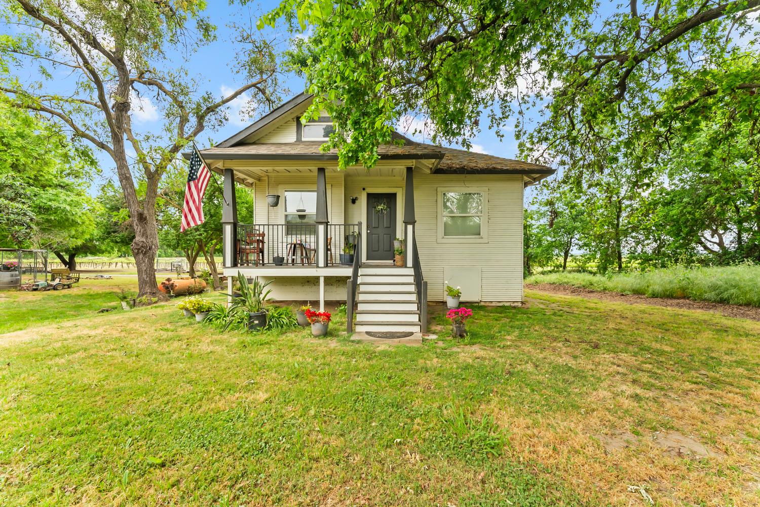 53020 South River Road Clarksburg, CA 95612 - Photo 14 of 42 a view of a house with backyard and a tree