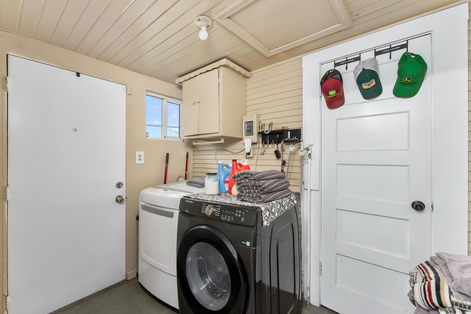 53020 South River Road Clarksburg, CA 95612 - Photo 29 of 42 a view of storage and utility room with washer and dryer