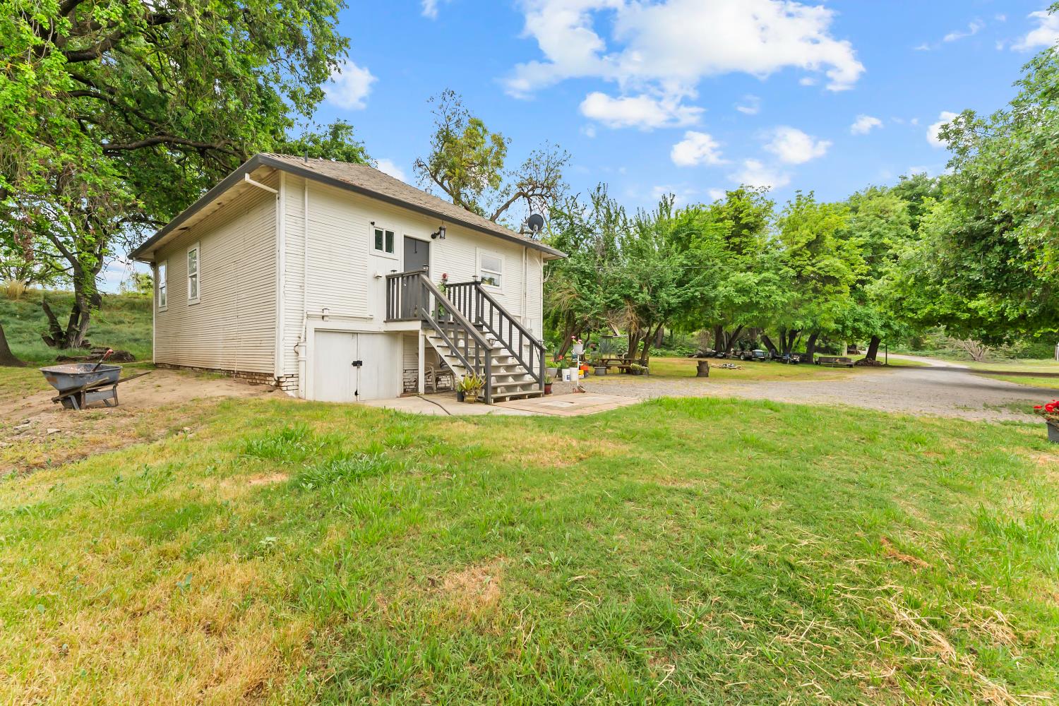 53020 South River Road Clarksburg, CA 95612 - Photo 38 of 42 a view of a house with backyard and a tree