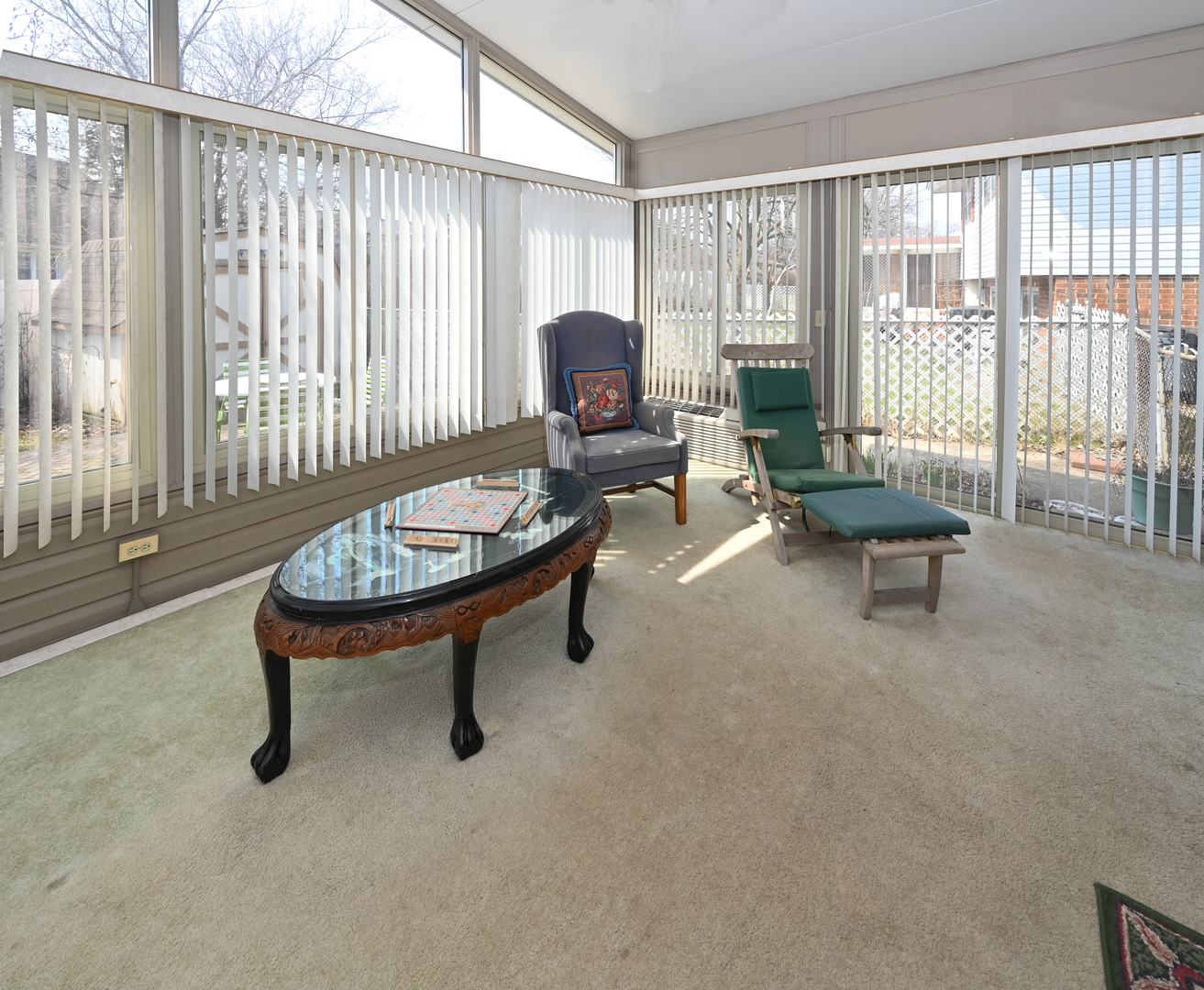 81 Grange Road Elk Grove Village, IL 60007 - Photo 15 of 32 a living room with furniture and a large window