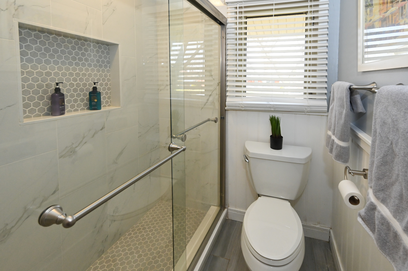 81 Grange Road Elk Grove Village, IL 60007 - Photo 26 of 32 a white toilet sitting next to a bathroom sink