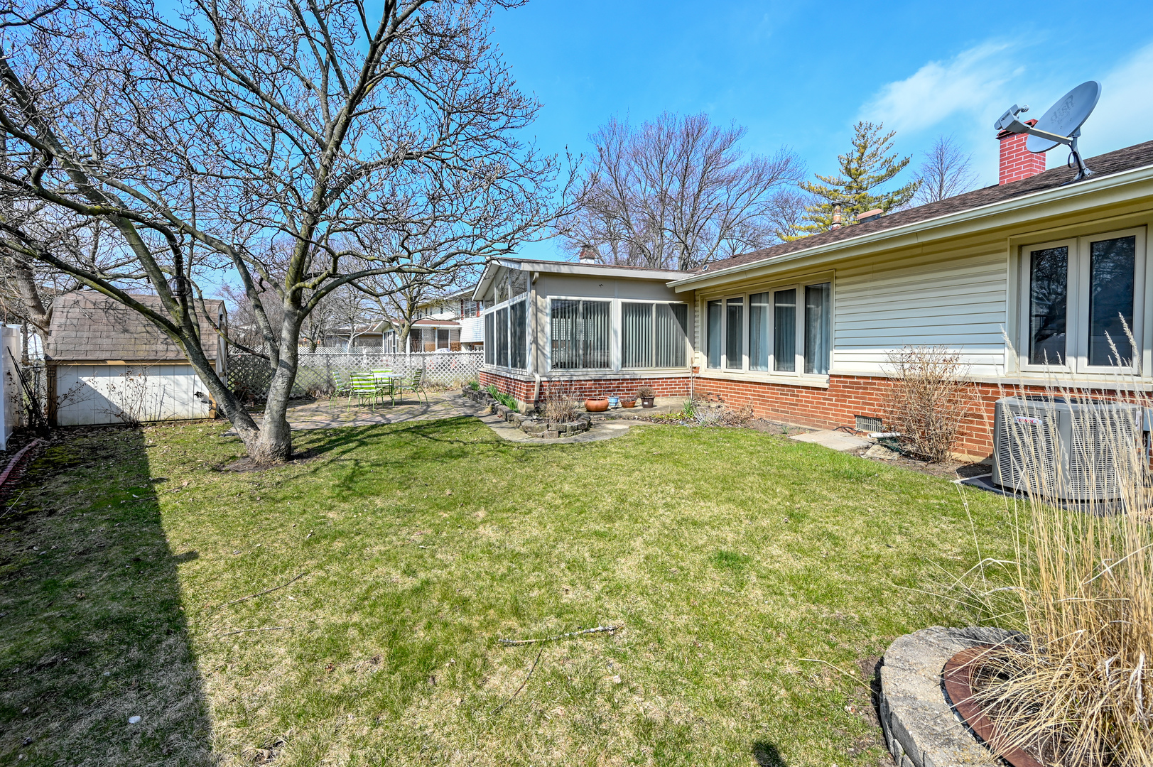 81 Grange Road Elk Grove Village, IL 60007 - Photo 31 of 32 a front view of a house with garden