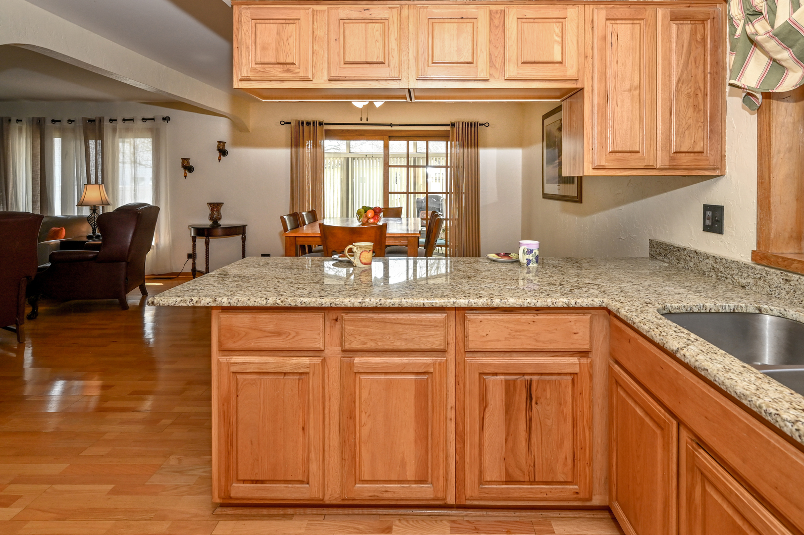 81 Grange Road Elk Grove Village, IL 60007 - Photo 5 of 32 a kitchen with granite countertop a sink and dishwasher with granite countertops