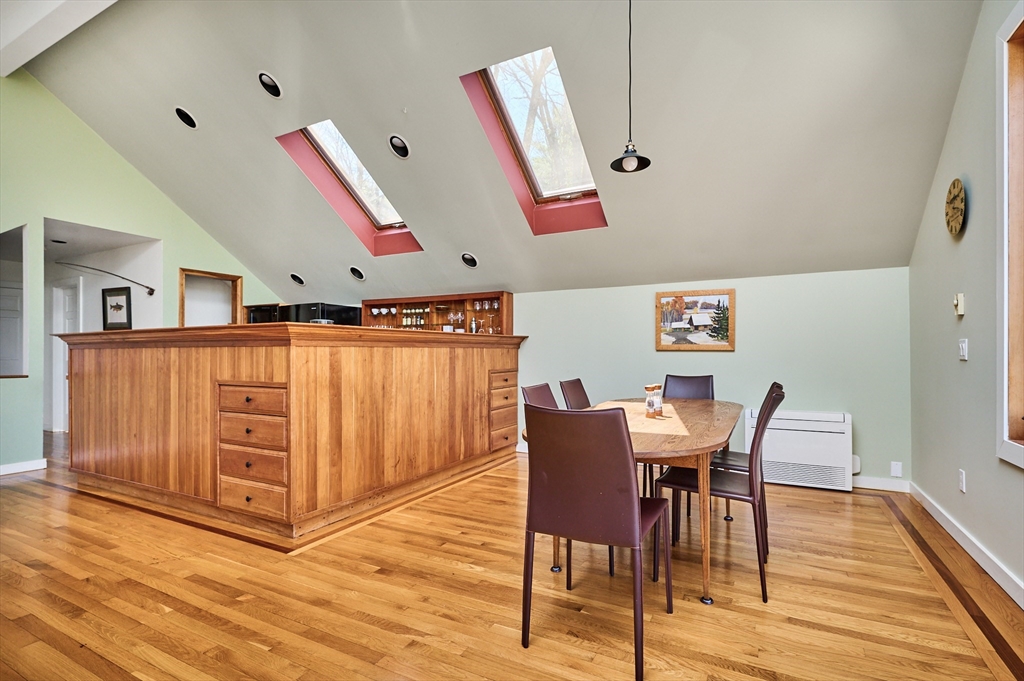 11 Shutesbury Road Leverett, MA 01054 - Photo 11 of 40 a view of a dining room with furniture and wooden floor