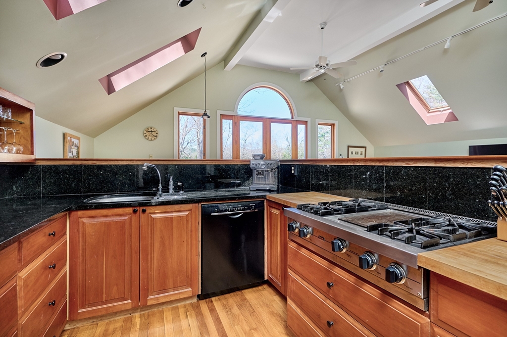 11 Shutesbury Road Leverett, MA 01054 - Photo 12 of 40 a kitchen with stainless steel appliances granite countertop a stove and a sink