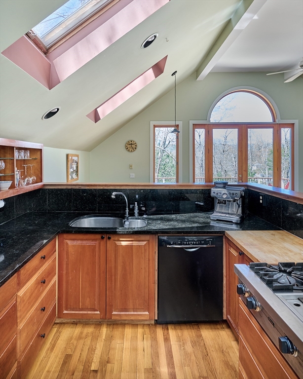 11 Shutesbury Road Leverett, MA 01054 - Photo 13 of 40 a kitchen with stainless steel appliances granite countertop a stove and a sink