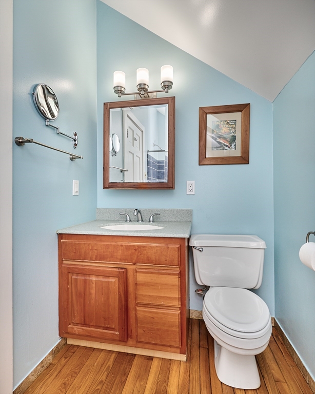 11 Shutesbury Road Leverett, MA 01054 - Photo 17 of 40 a bathroom with a toilet a sink and mirror