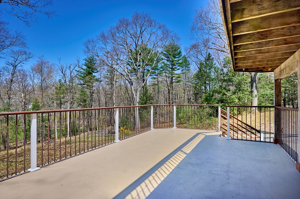 11 Shutesbury Road Leverett, MA 01054 - Photo 30 of 40 a balcony with view of palm trees