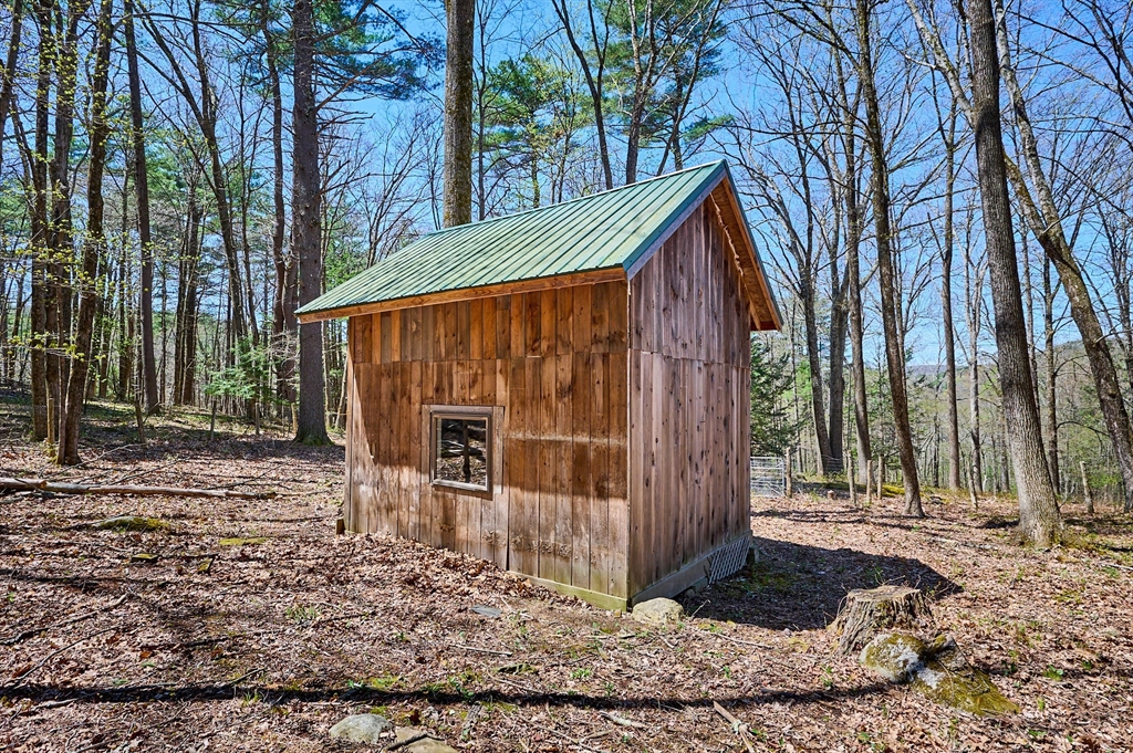 11 Shutesbury Road Leverett, MA 01054 - Photo 31 of 40 a view of a house with a outdoor space