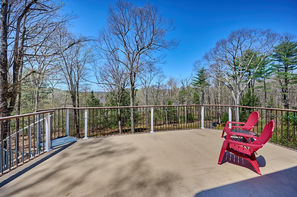 11 Shutesbury Road Leverett, MA 01054 - Photo 10 of 40 a view of a chairs with fire pit in the patio
