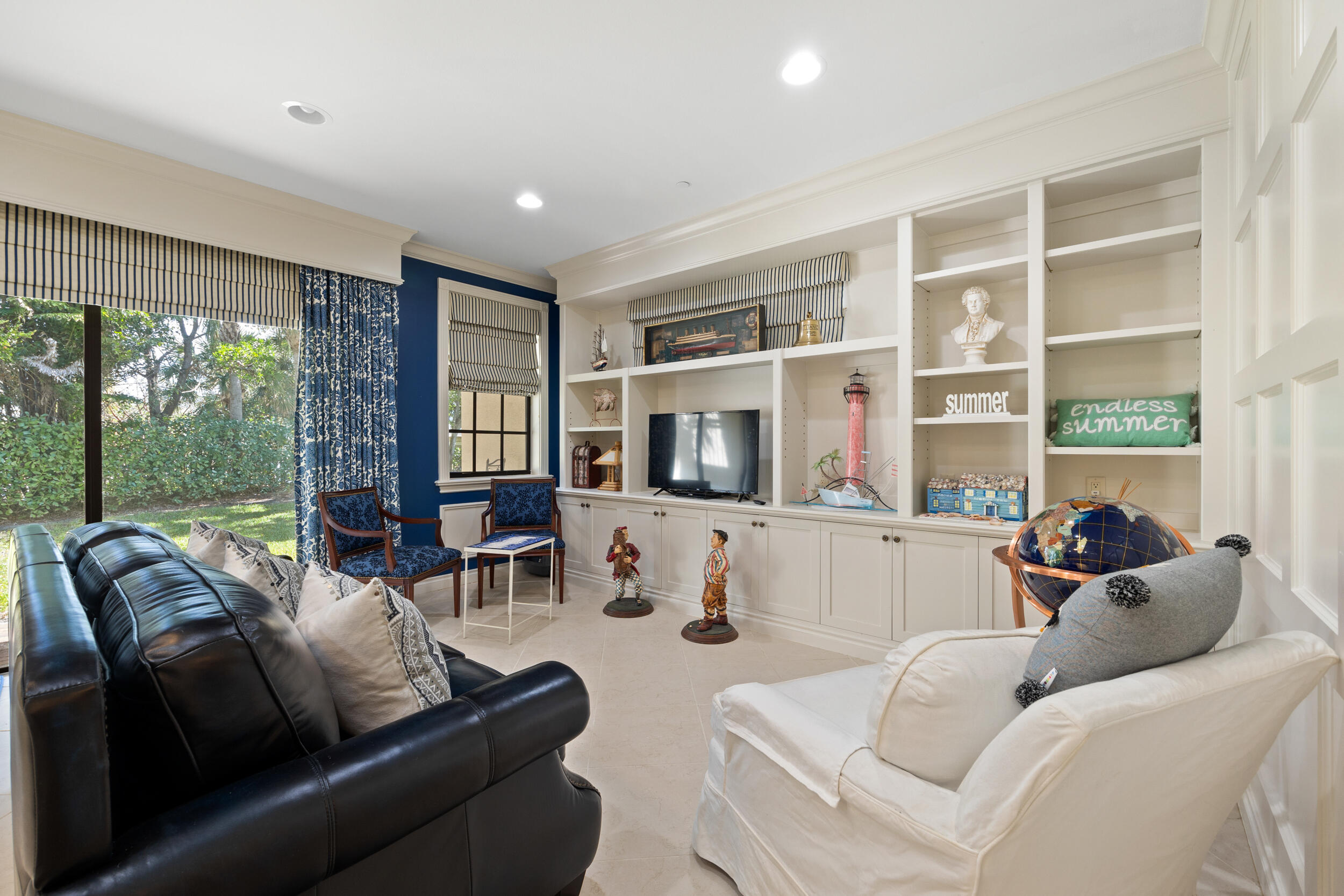 405 Del Sol Circle Tequesta, FL 33469 - Photo 39 of 53 a living room with furniture and a large window