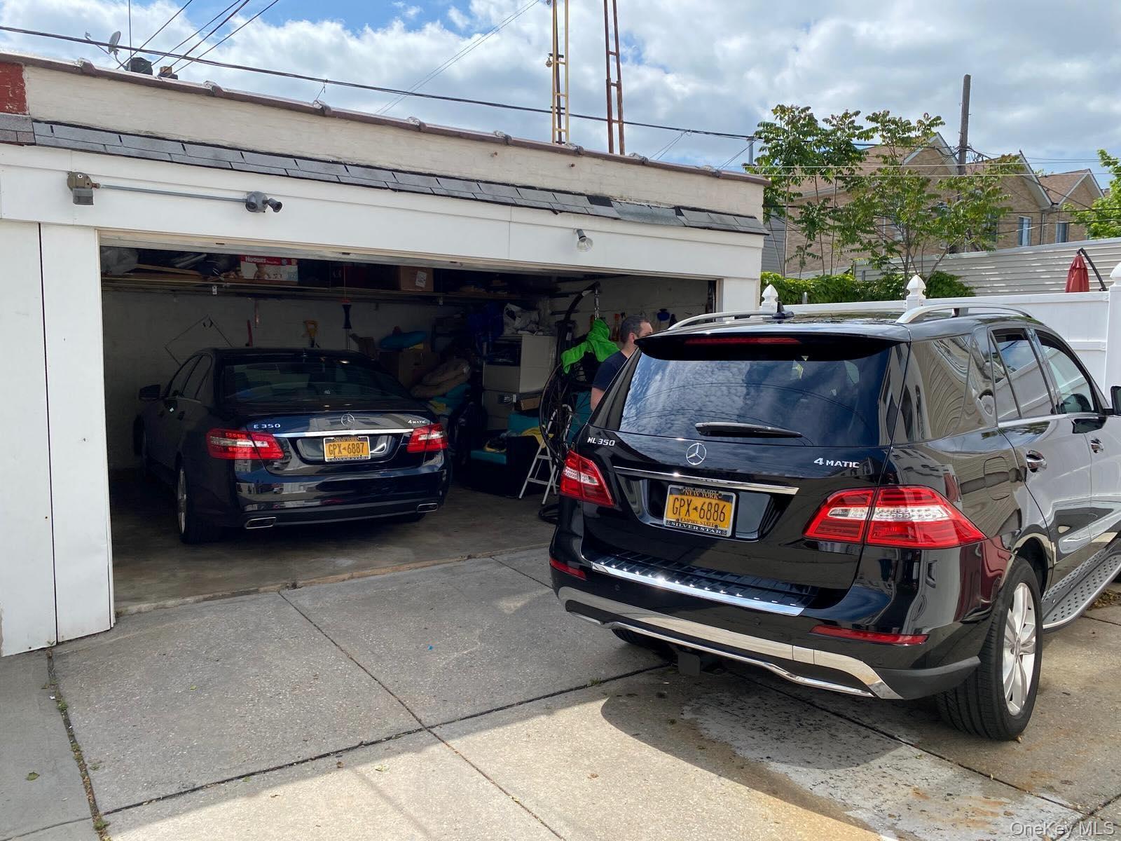 70-18 68th Street Queens, NY 11385 - Photo 11 of 12 a view of parking garage with cars
