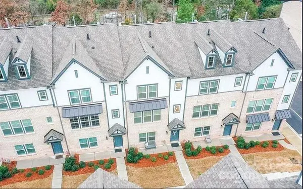 a very nice looking dining room with a large window