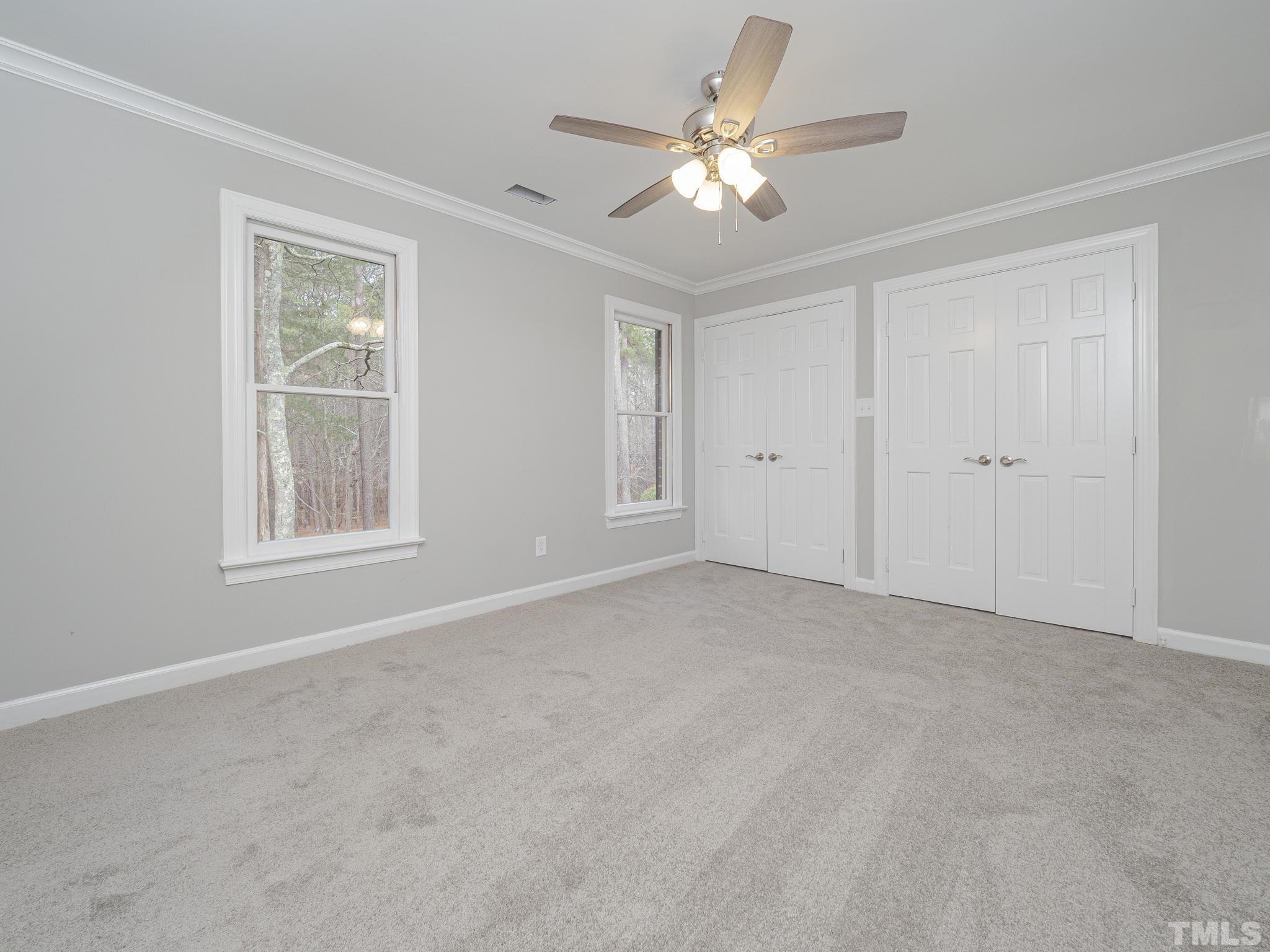 9408 Barton Creek Road Raleigh, NC 27615 - Photo 15 of 20 a view of an empty room with a window