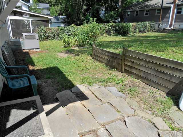 1320 Mordecai Drive Raleigh, NC 27604 - Photo 13 of 22 There is a rustic stone patio out the kitchen door, and...