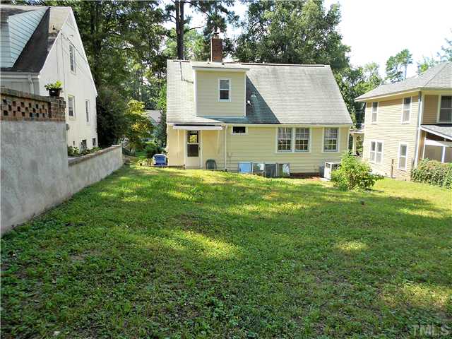 1320 Mordecai Drive Raleigh, NC 27604 - Photo 19 of 22 Another view of the back yard---lots of open space for a garden...