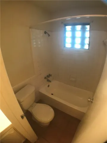 a bathroom with a sink a shower and a mirror