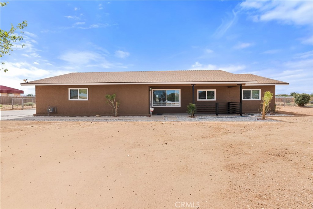 20631 Zuni Road Apple Valley, CA 92307 - Photo 2 of 25 a house view with a backyard space