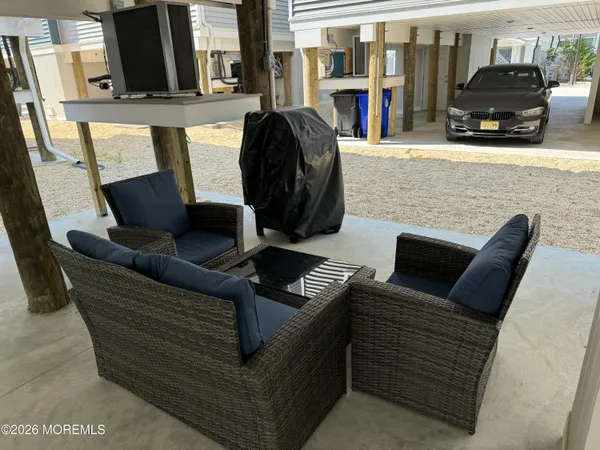 a view of a water with a large tree