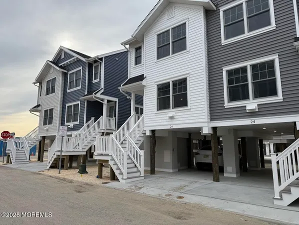 a view of a car park in front of house