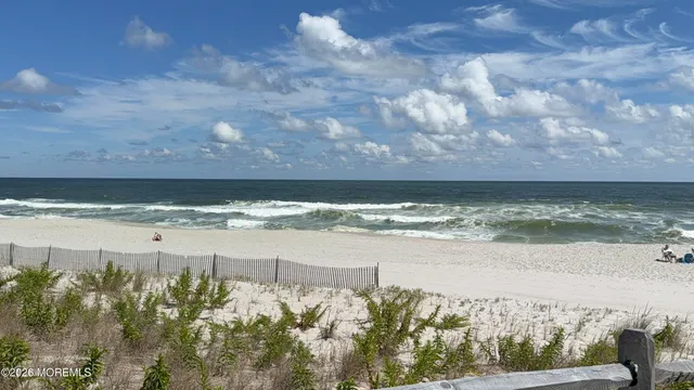 a view of a lake from a balcony