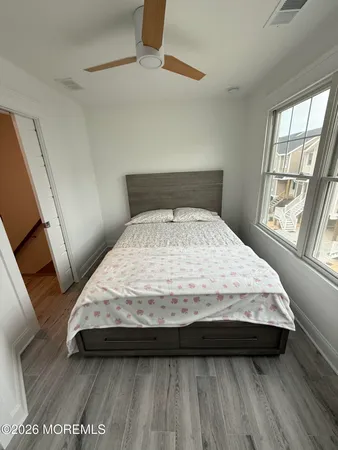 a room with furniture and a wooden floor