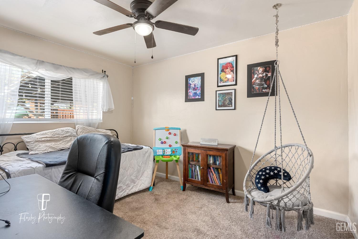 Undisclosed Address Bakersfield, CA 93304 - Photo 21 of 28 a living room with furniture and window