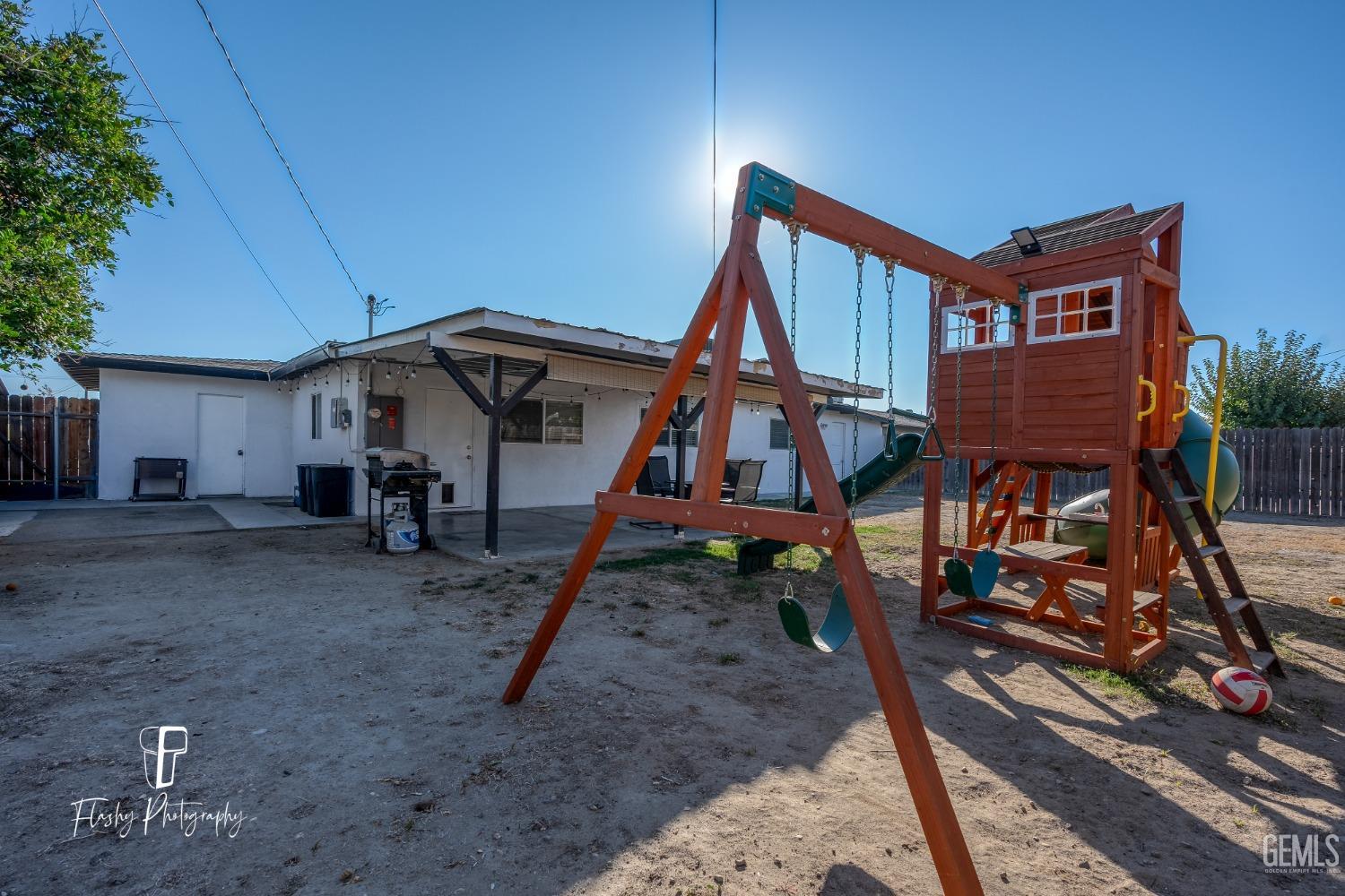 Undisclosed Address Bakersfield, CA 93304 - Photo 24 of 28 a house view with a backyard space