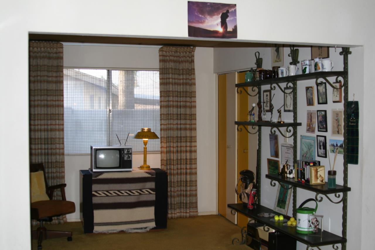 3216 West Redfield Road Phoenix, AZ 85053 - Photo 7 of 24 a view of a room with gym equipment