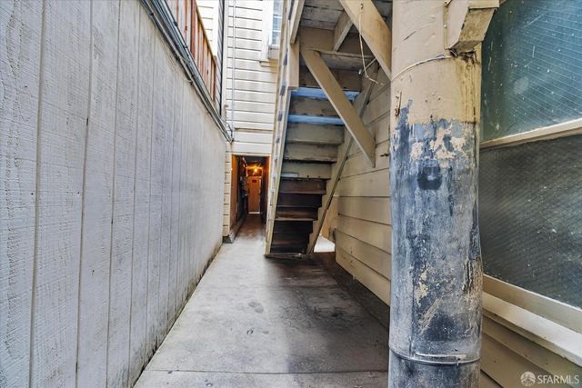 a view of a car park in front of house