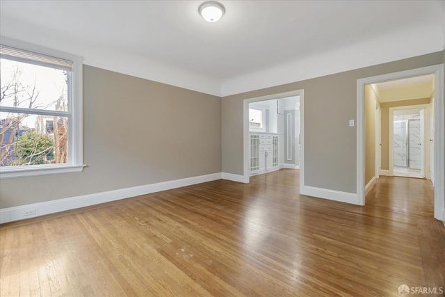 a view of a glass door and a yard from a window